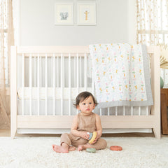 aden + anais essentials changing pad cover coordinates with crib bedding for a cohesive nursery