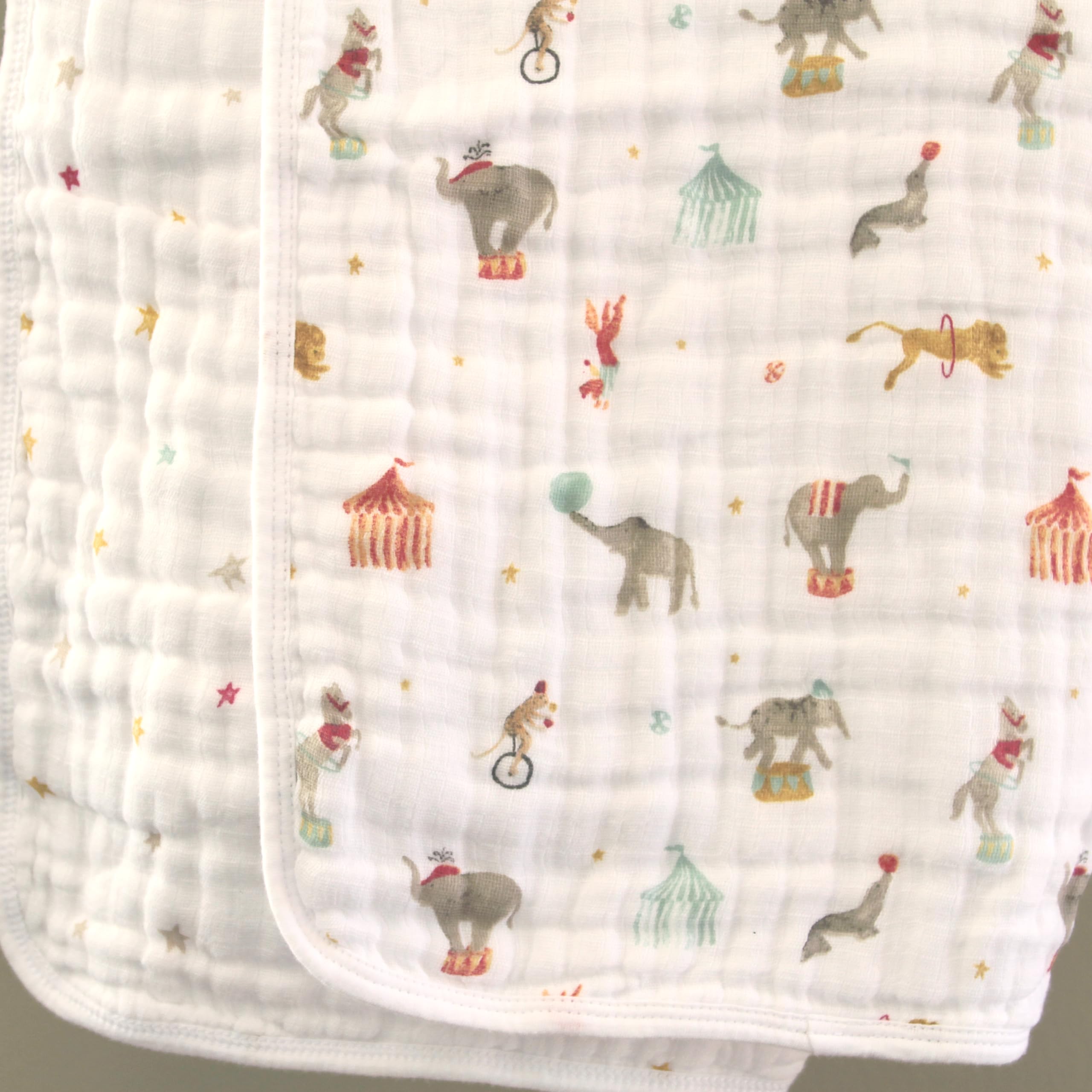 aden + anais Essentials Dream Blanket laid flat to show 44x44 size and fabric