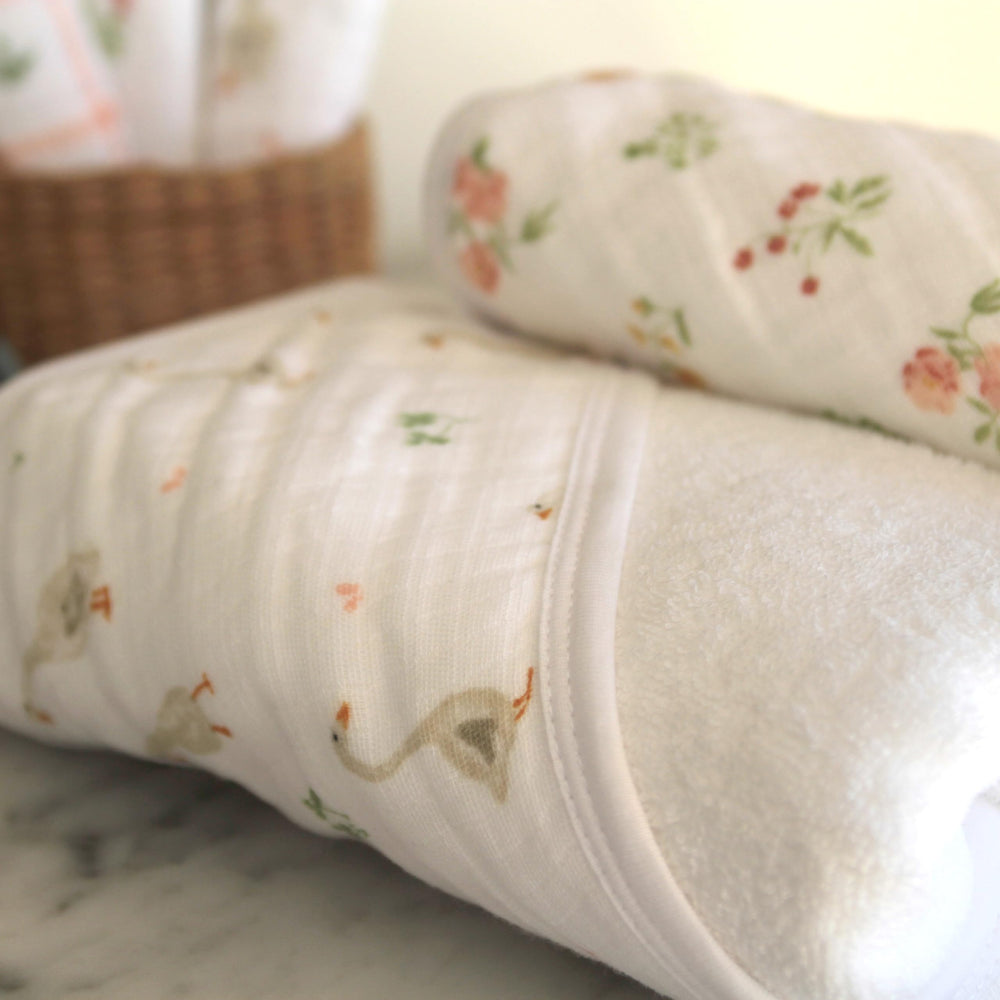 aden and anais Essentials hooded towel Country Floral towel folded, absorbent cotton terry wraps snugly