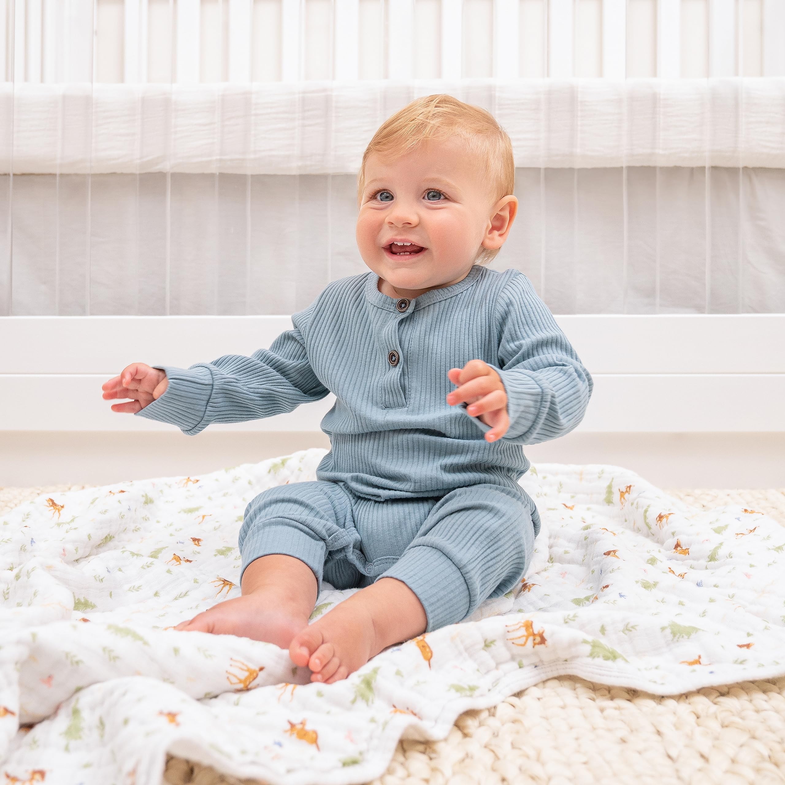 aden + anais Essentials four-layer muslin blanket closeup showing soft texture and breathable comfort.