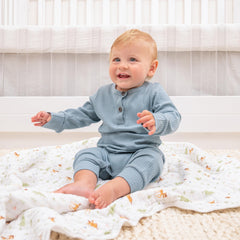 aden + anais Essentials four-layer muslin blanket closeup showing soft texture and breathable comfort.