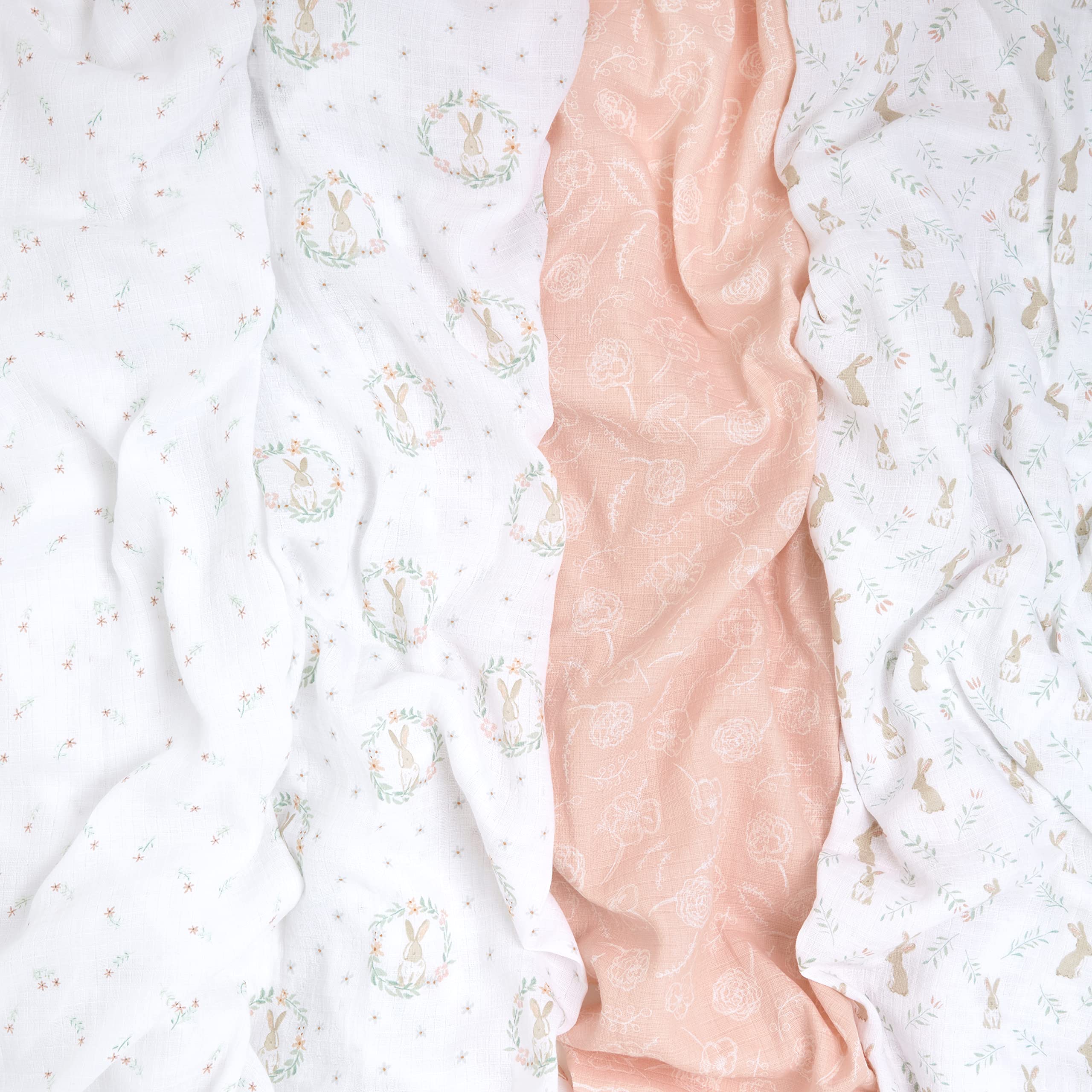 aden + anais muslin swaddle blanket Blushing Bunnies demonstrates oversized 44-inch square versatility for daily use.
