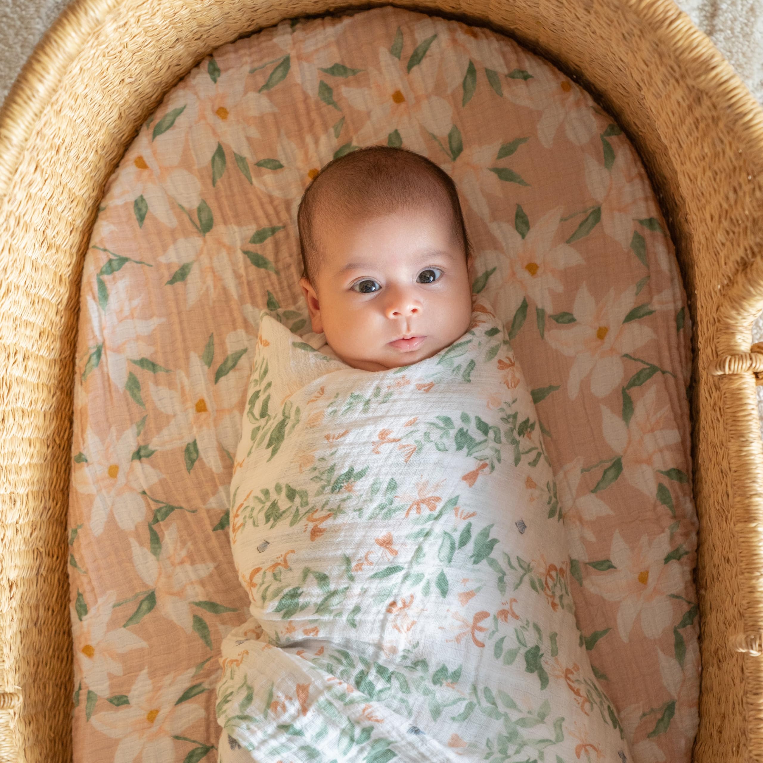 aden + anais Butterfly Garden swaddled baby shows breathable comfort for newborn moments