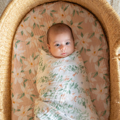 aden + anais Butterfly Garden swaddled baby shows breathable comfort for newborn moments