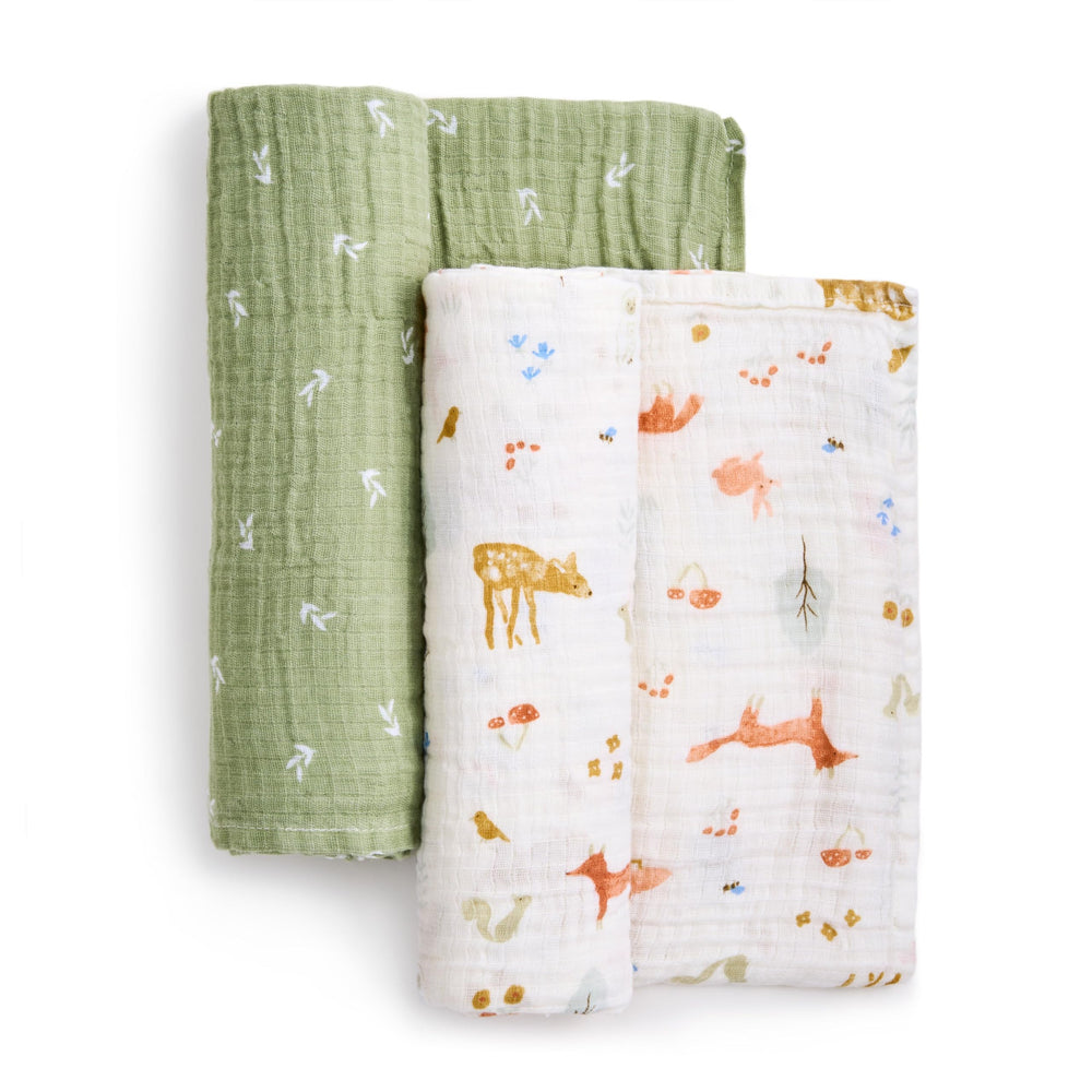 aden + anais Essentials muslin swaddle Sage Woodland serving as a nursing cover or burp cloth.