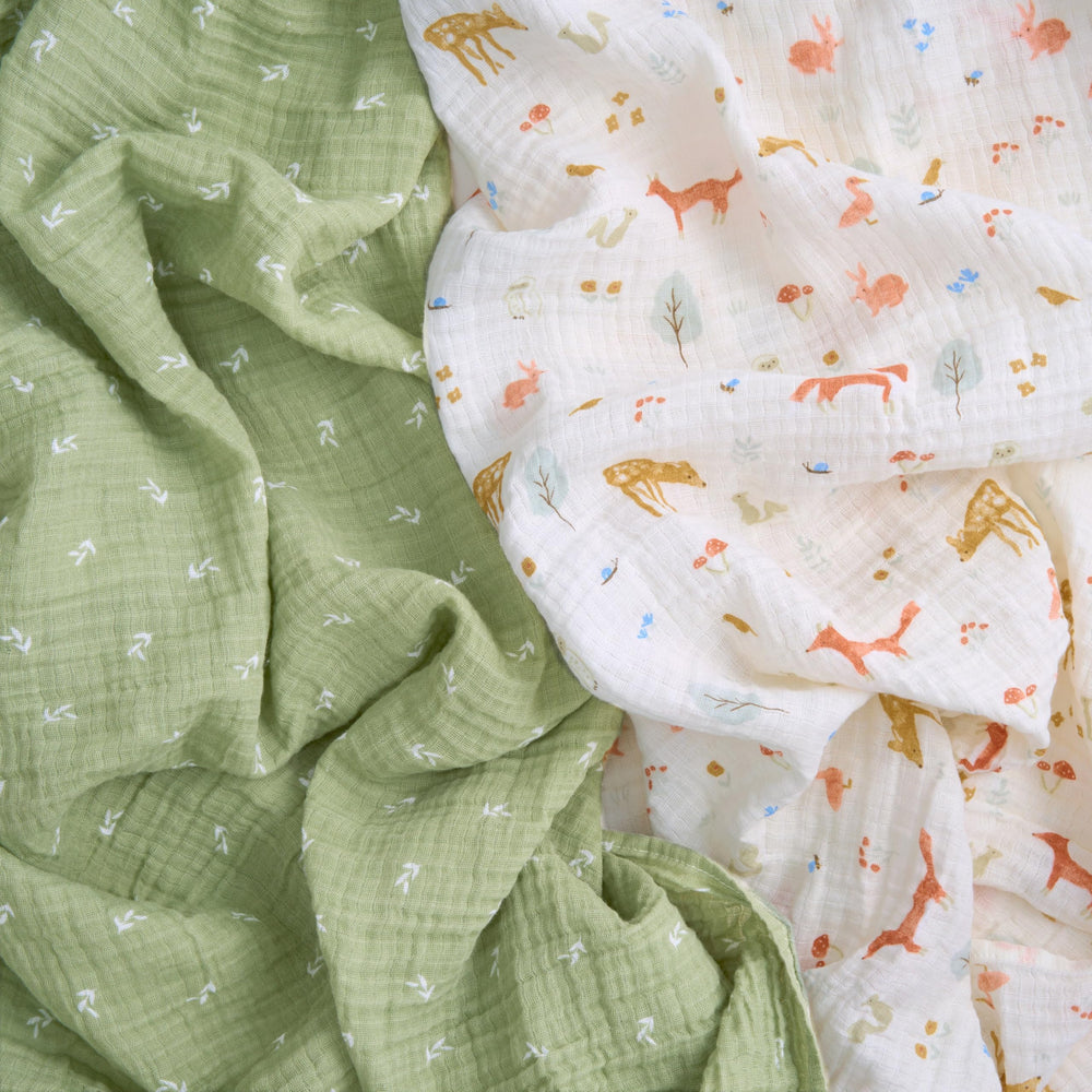 aden + anais Essentials muslin swaddle Sage Woodland laid flat for lightweight, soft newborn comfort.
