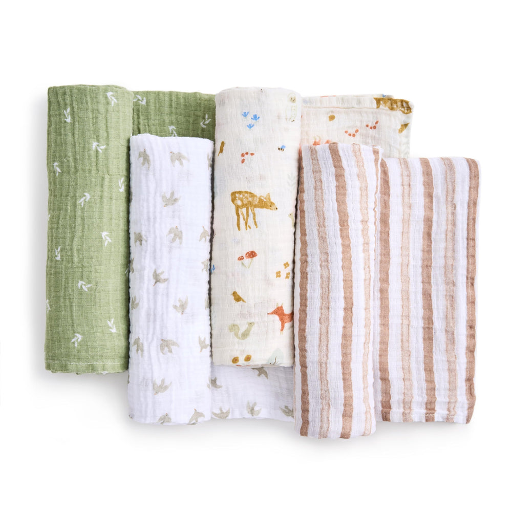 aden + anais essentials muslin swaddle soft fabric close-up highlights versatile 44x44 multi-use blanket.