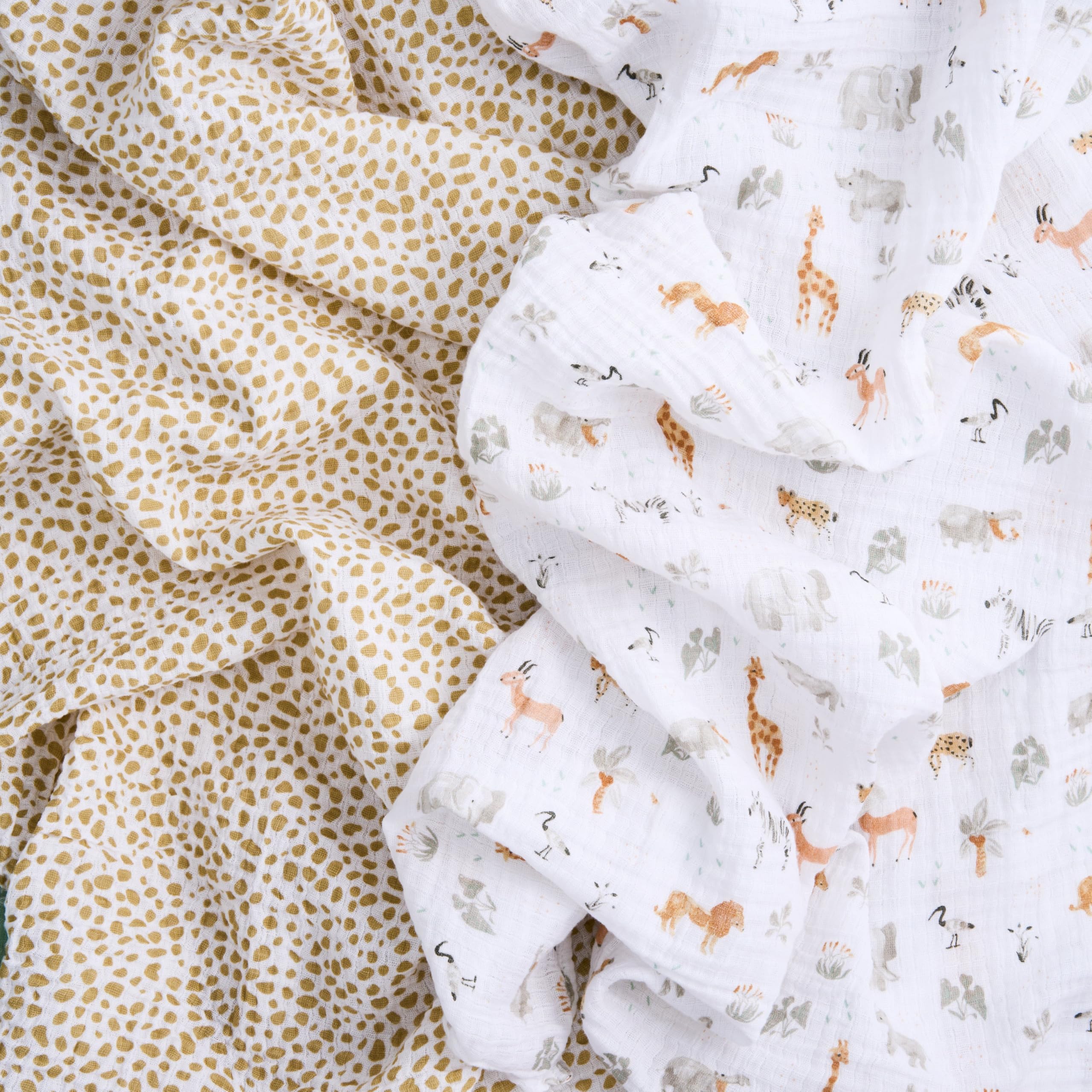aden + anais swaddle used as stroller cover keeps baby protected and comfortable