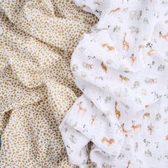 aden + anais swaddle used as stroller cover keeps baby protected and comfortable