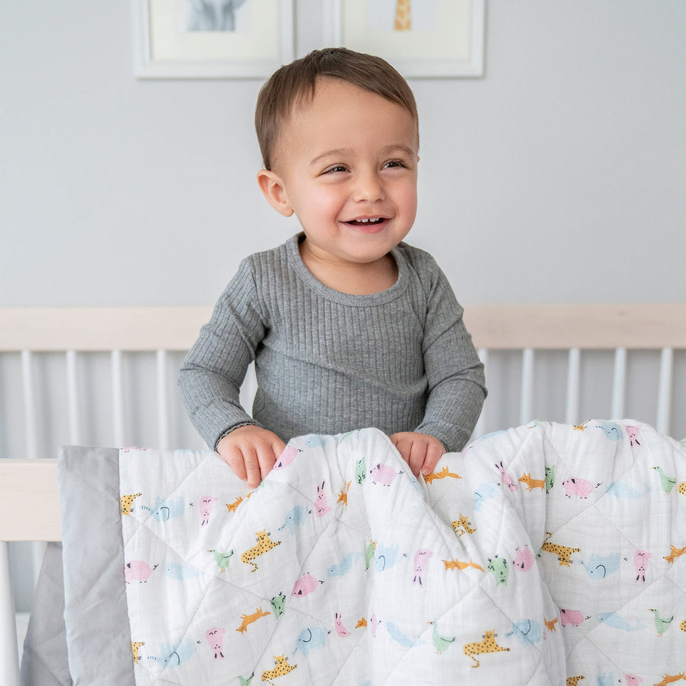 Aden + Anais Essentials nursery look featuring coordinated sheets and covers for a cohesive space.