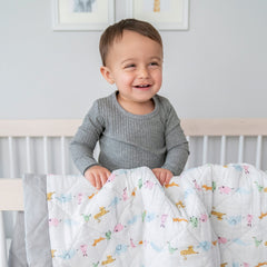 Aden + Anais Essentials nursery look featuring coordinated sheets and covers for a cohesive space.