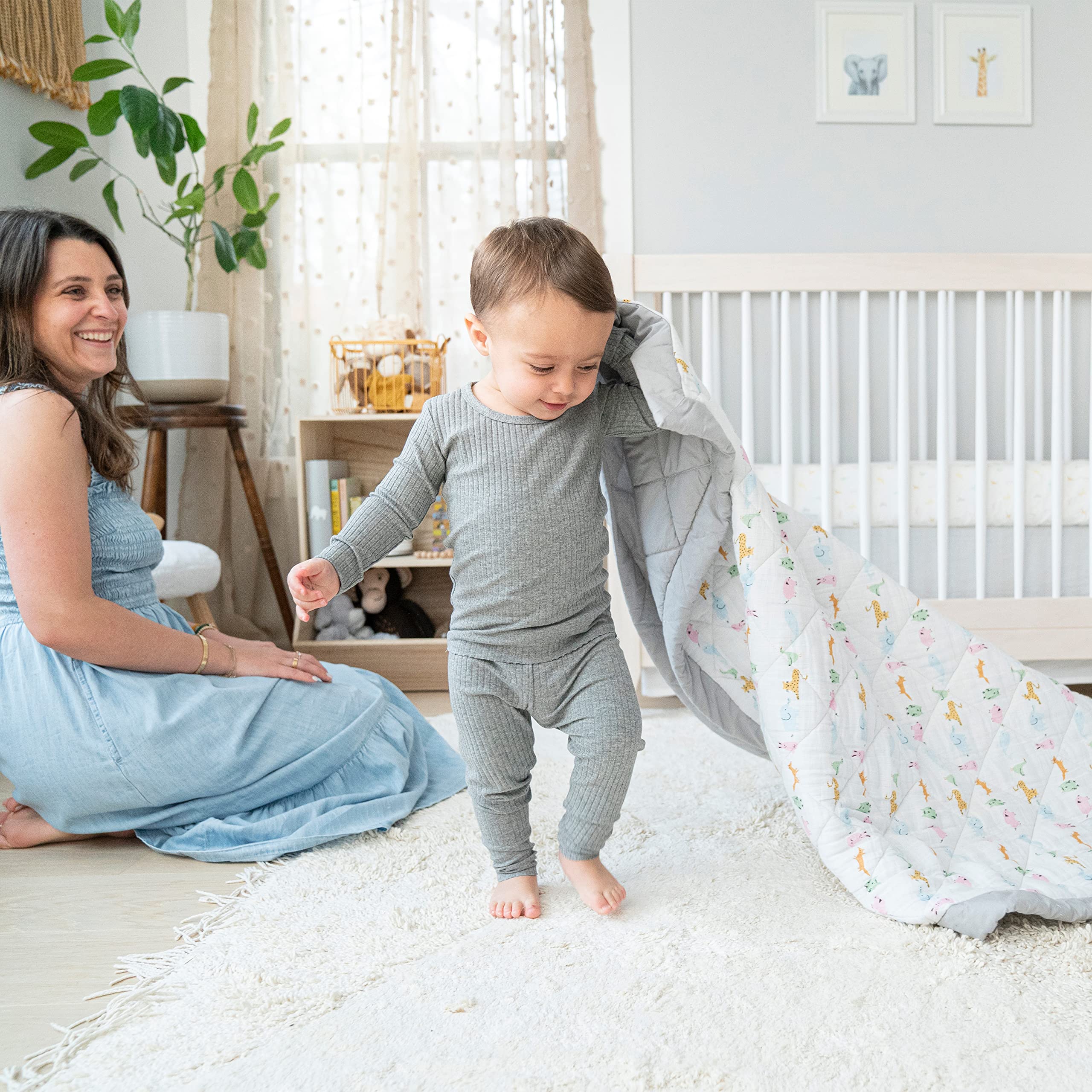Aden + Anais Essentials reversible blanket close-up showing cotton muslin front and poplin back.