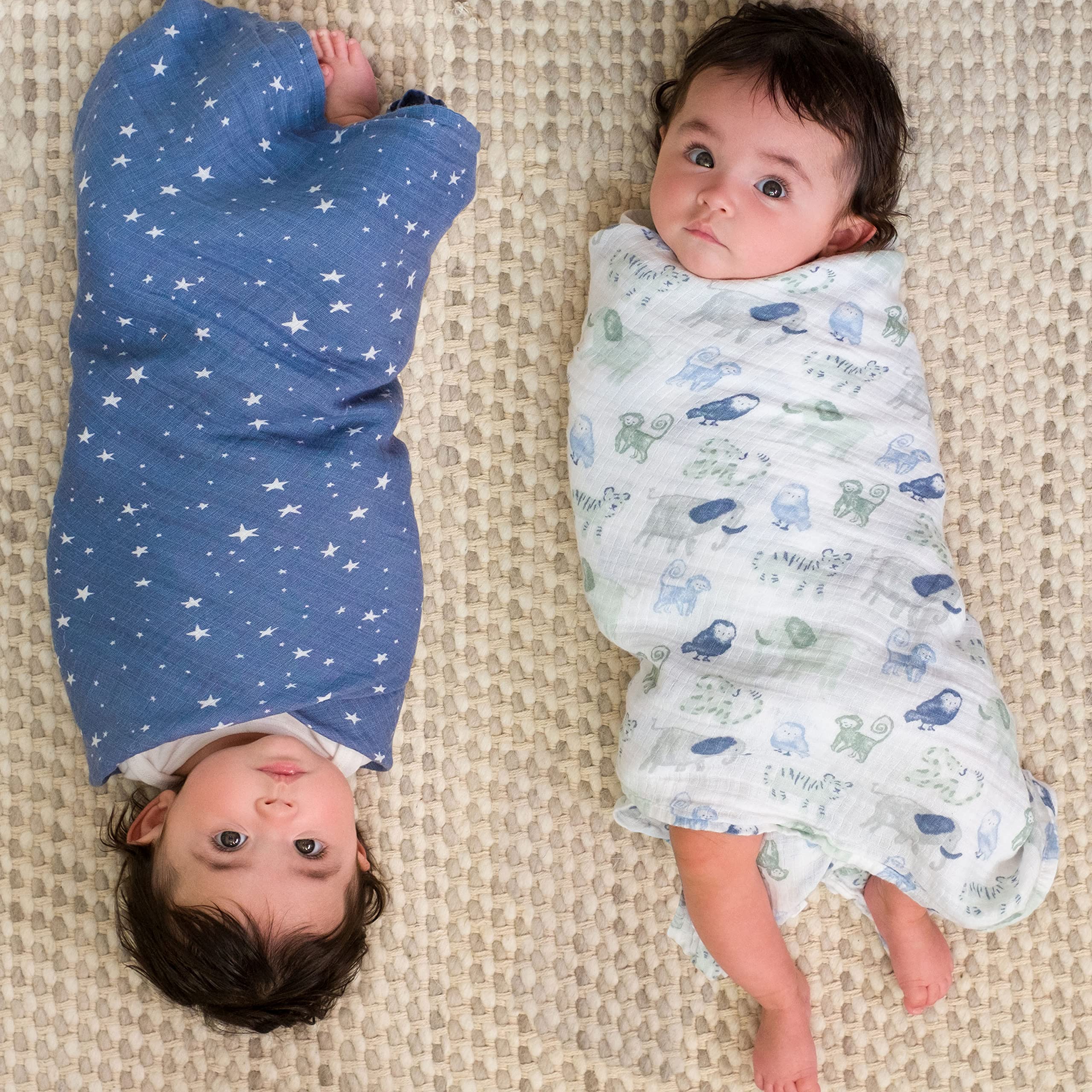 aden + anais Essentials swaddle blanket used as burp cloth helps keep messes contained.