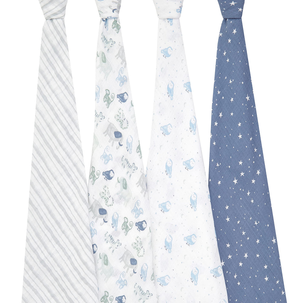 aden + anais Essentials swaddle blanket prints on display highlight coordinated nursery style.