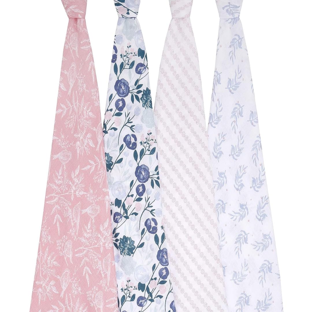 aden + anais Flower's Bloom swaddle wrapped around baby for snug swaddling.