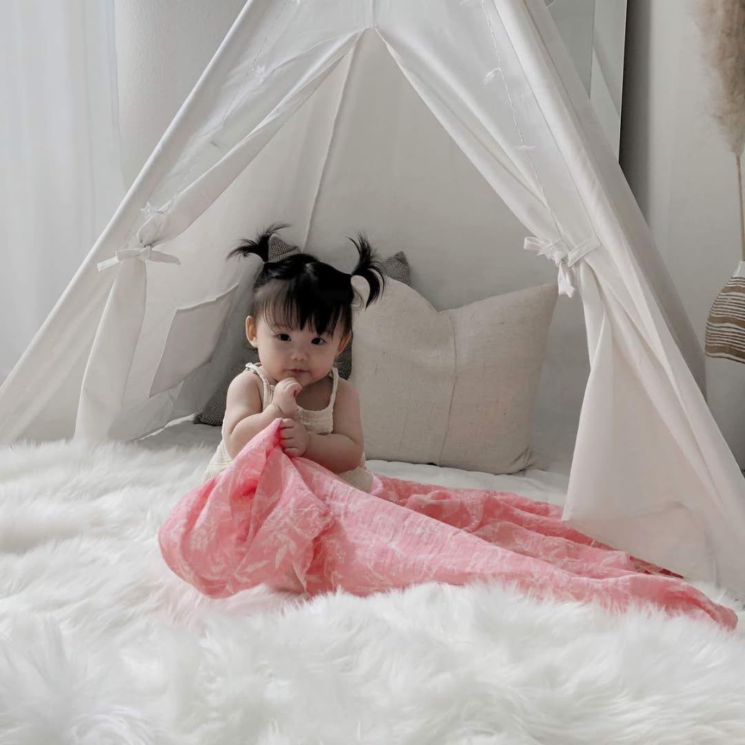 aden + anais Flower's Bloom close-up on breathable muslin texture and gentle softness.
