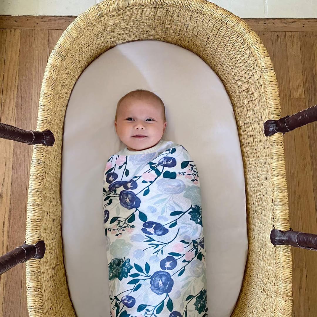 aden + anais Flower's Bloom blankets laid out to spark coordinating nursery style.