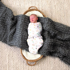 aden + anaïs Winnie swaddle demonstrating bottom zipper for quick diaper changes