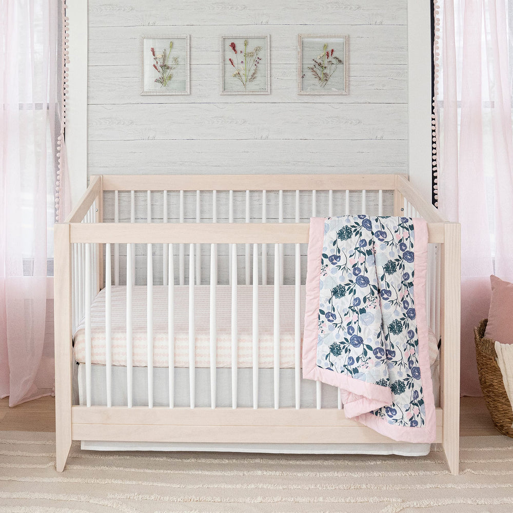 aden + anais Flowers Bloom crib skirt full view demonstrating snug fit for standard cribs