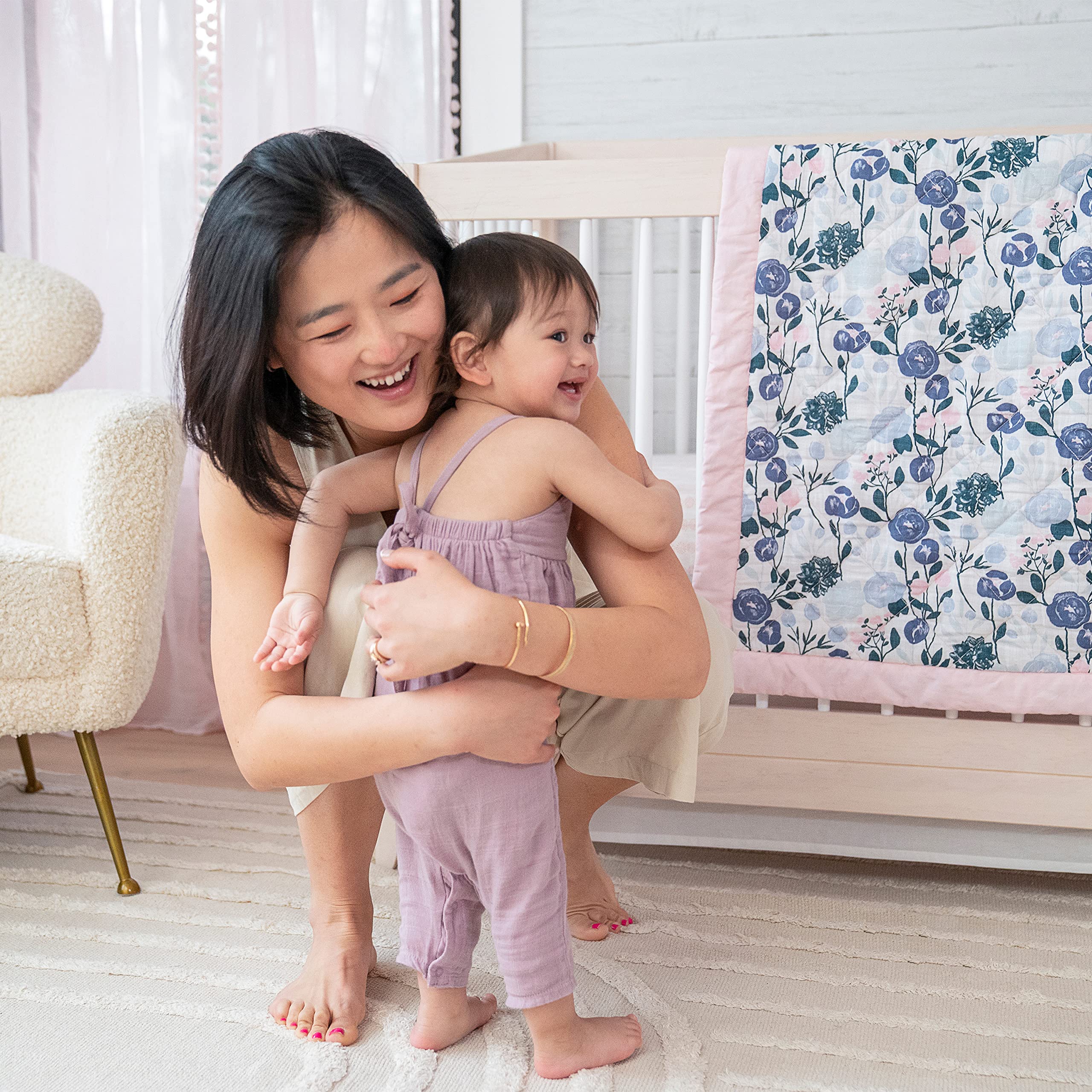 aden + anais Flowers Bloom nursery setup shows coordinated nursery decor