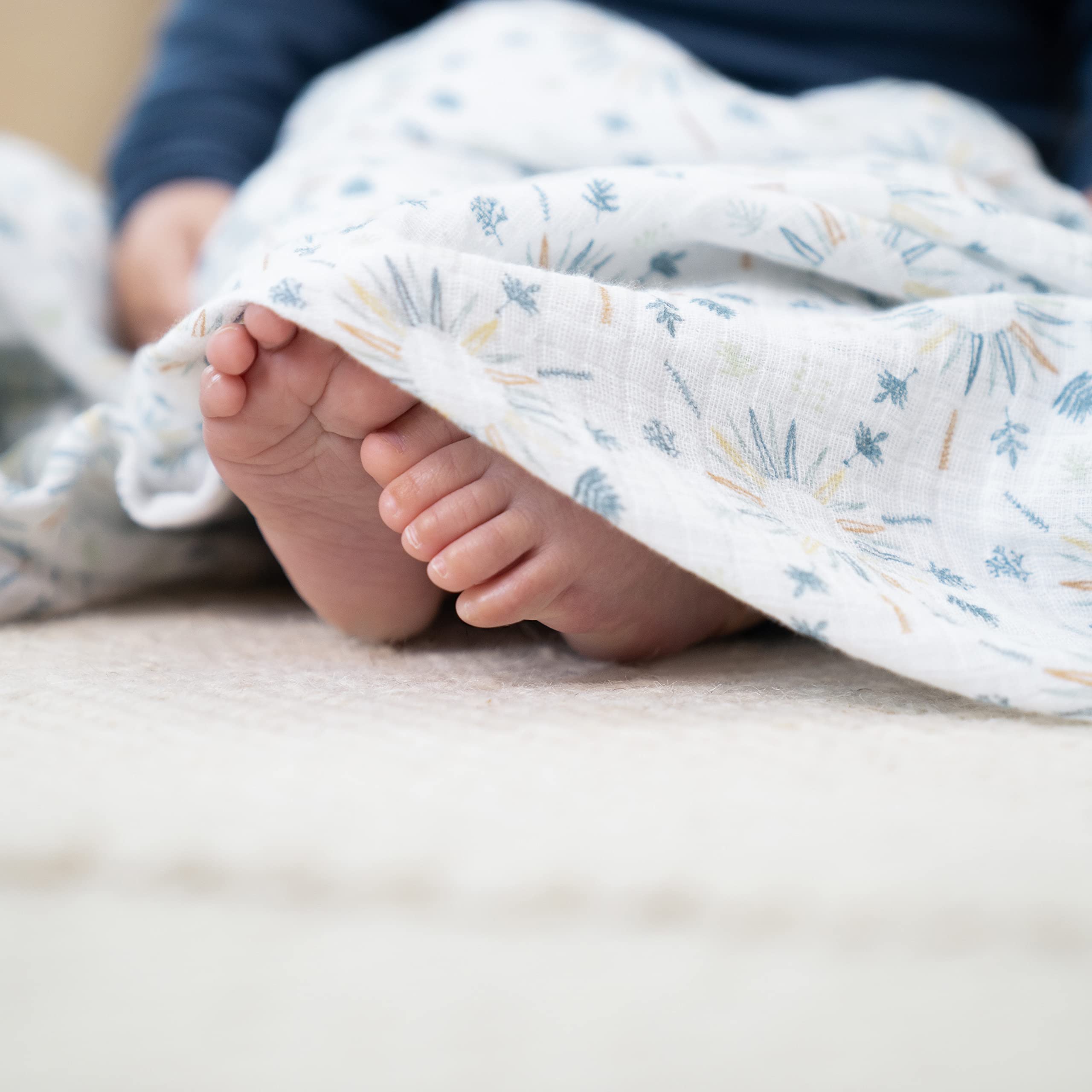aden +anais Harmony large 44x44 swaddle laid flat, showcasing generous wrap space.