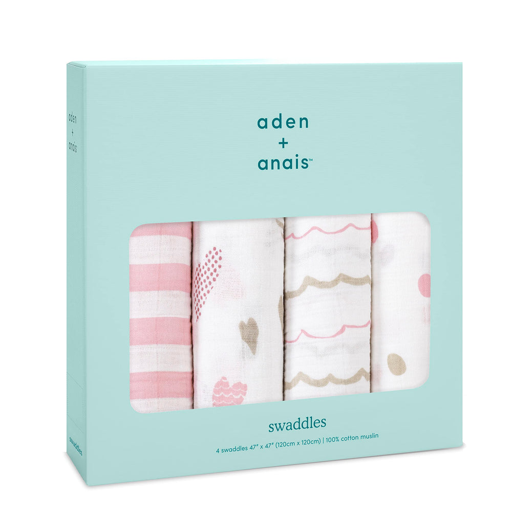 aden + anais Heart Breaker swaddle blanket wrapped around baby for cozy naps