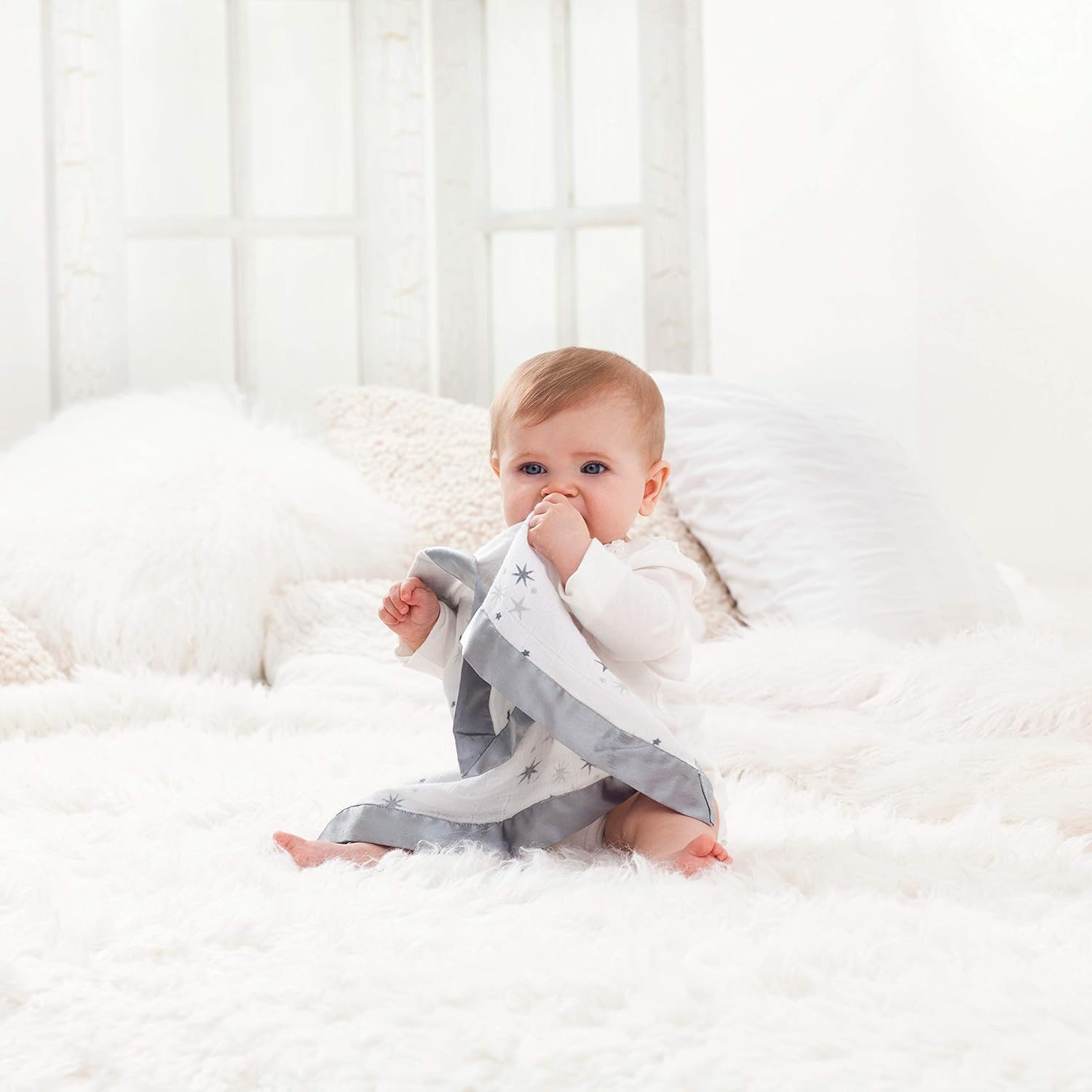 Issie security blanket satin trim closeup highlights silky texture for soothing touch.