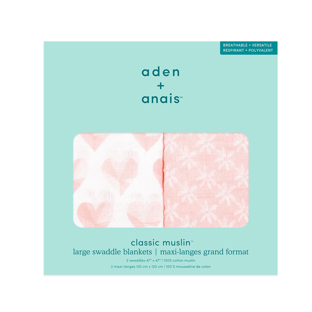 aden + anais Piece of My Heart swaddle in use illustrates gentle wrap for newborn comfort