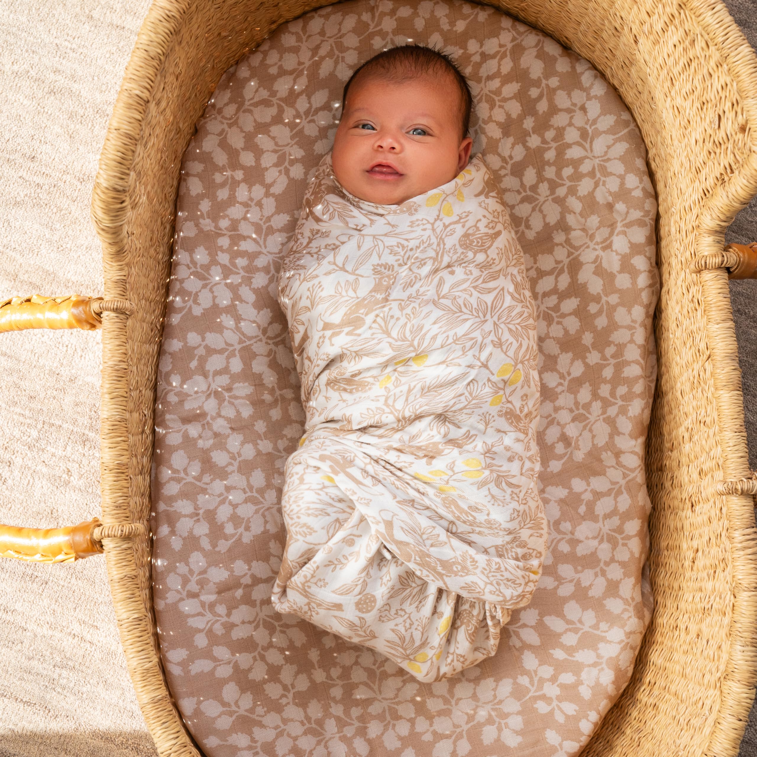 aden + anais Silky Soft Swaddle Woodland close-up highlights breathable, lightweight fabric for warm days.