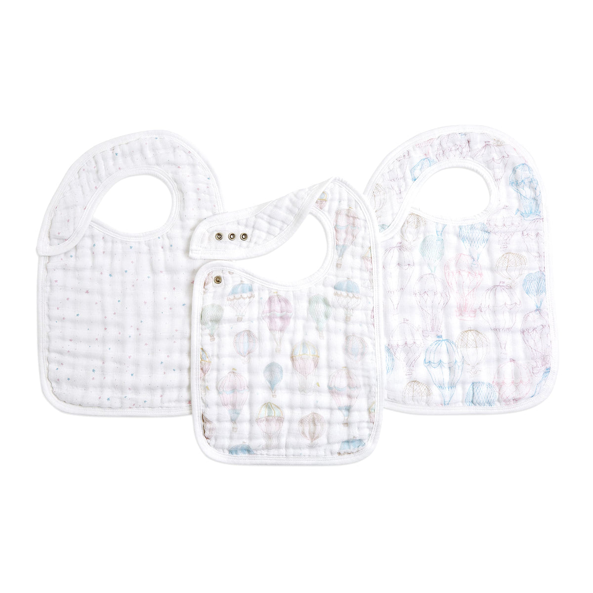 aden-anais snap bib above the clouds print front demonstrates three-layer absorbent muslin for spills.