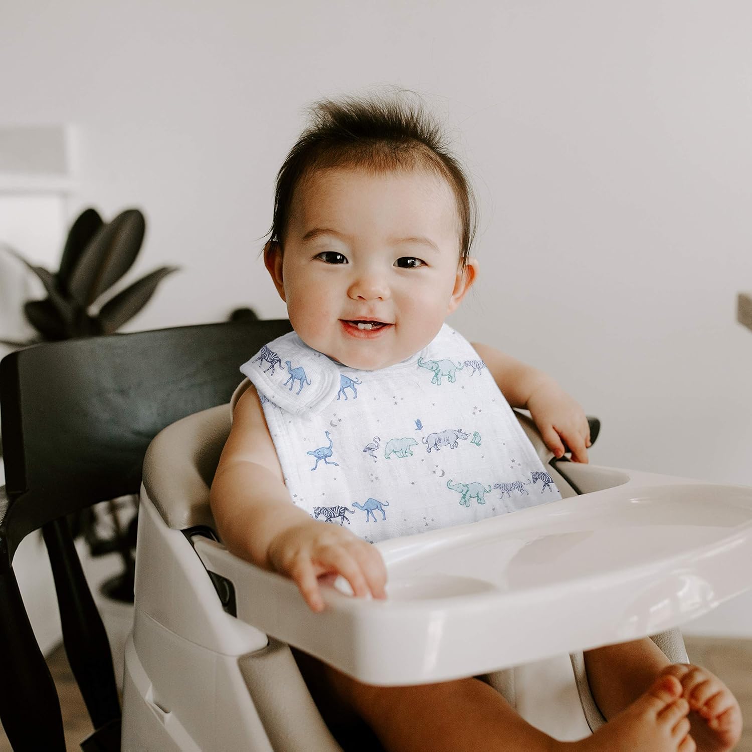 aden + anais Snap Bib adjustable front snaps enable growth with baby comfort.