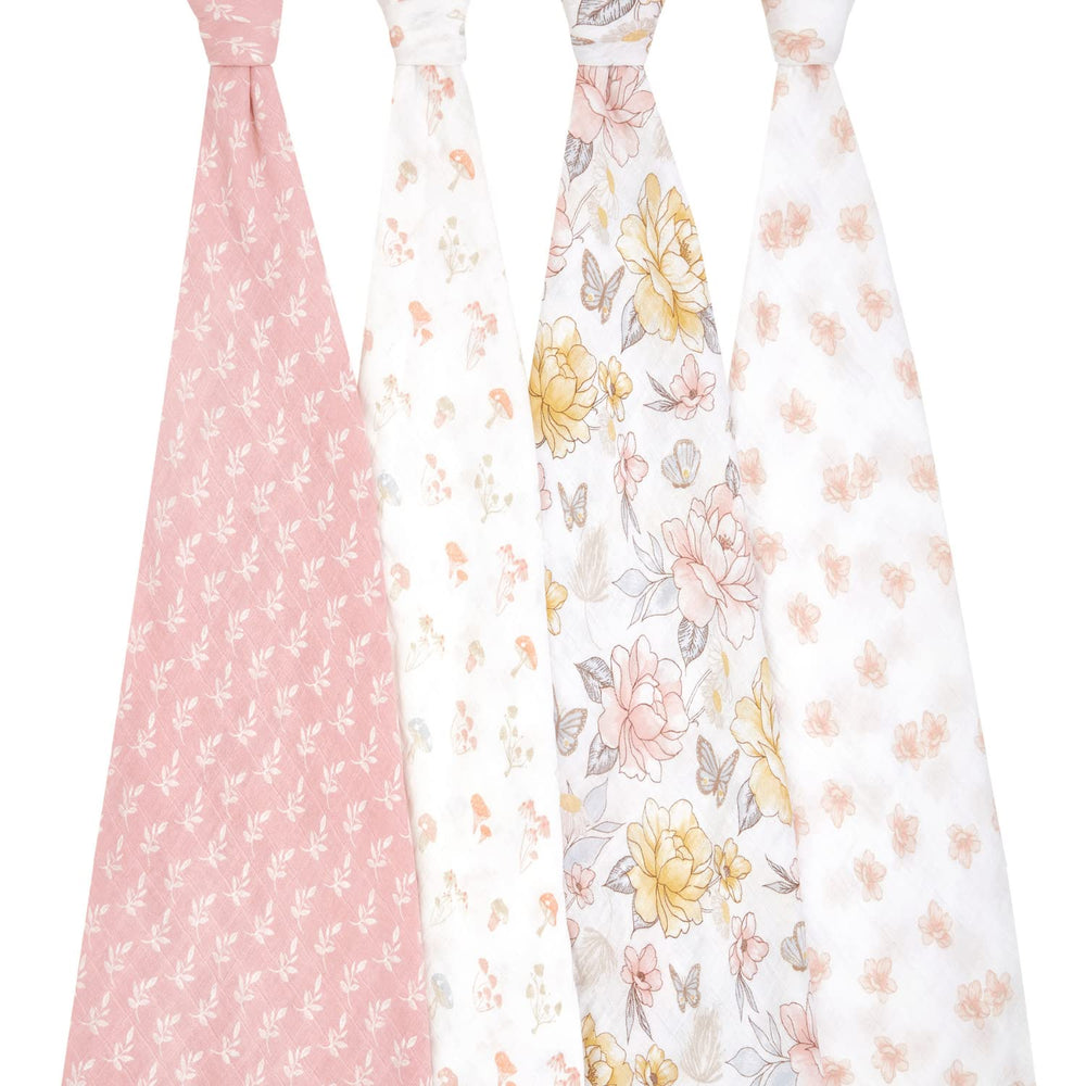 aden + anais Earthly swaddle blanket swaddling scene demonstrates cozy containment for calm newborn moments.