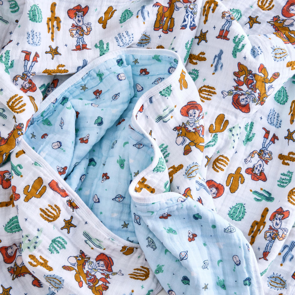aden + anais Woody blanket in stroller use demonstrates portable warmth during outings