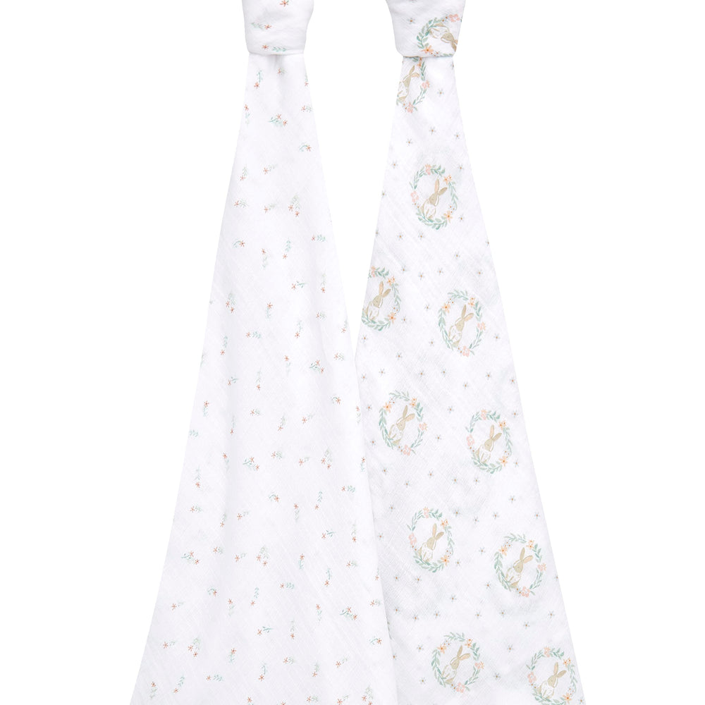 aden + anais Swaddle Blanket Blushing Bunnies used as a gentle receiving blanket.