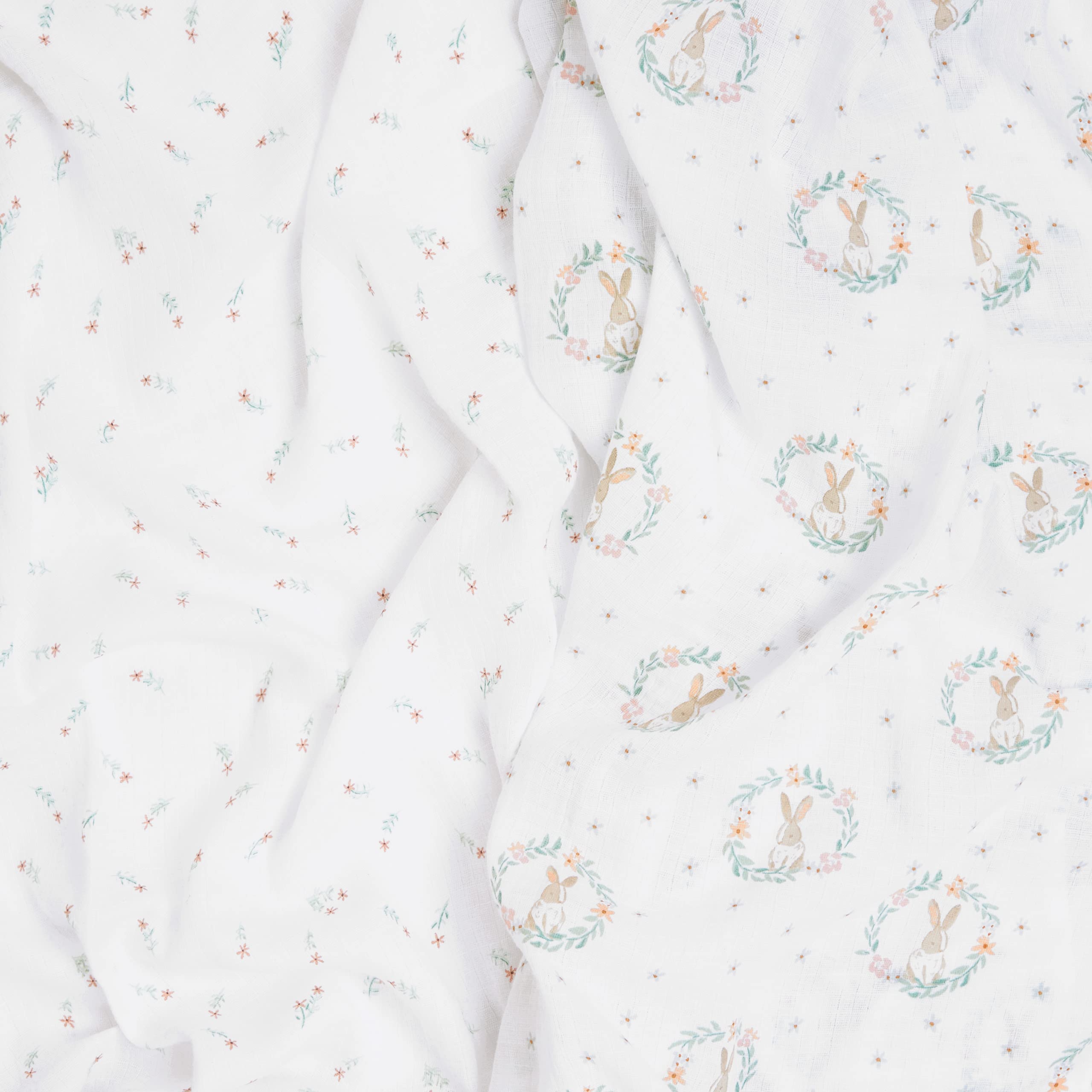 aden + anais Blushing Bunnies muslin swaddle blanket delivers breathable comfort on outings.