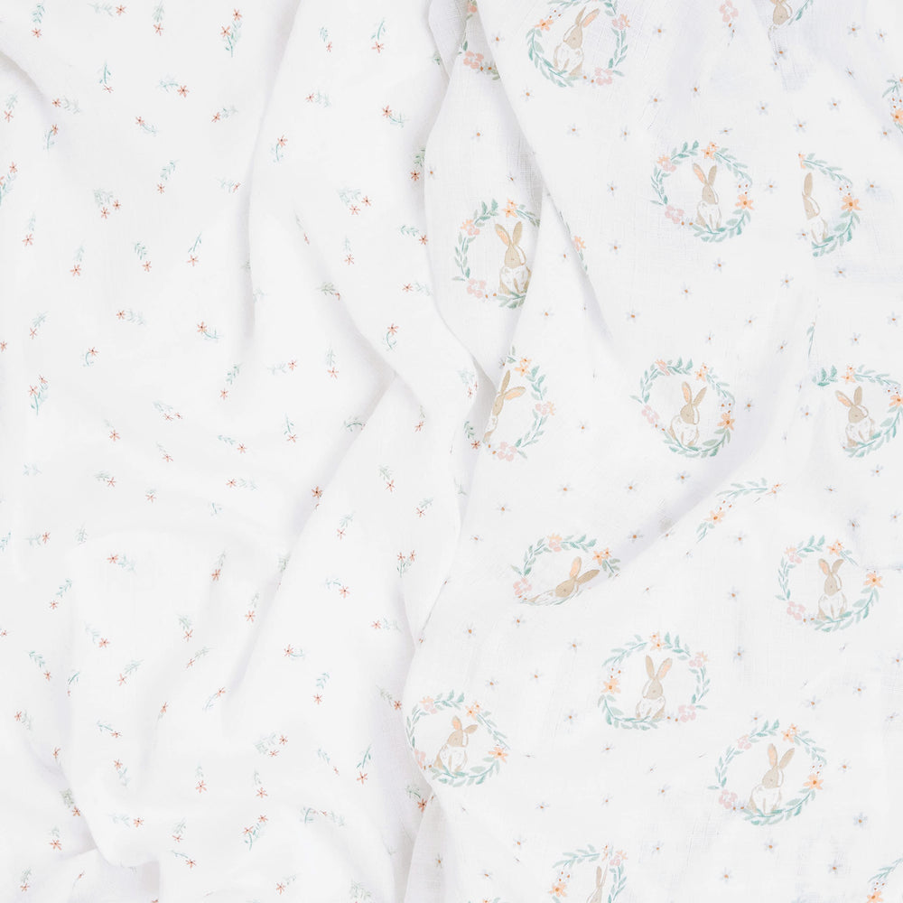 aden + anais Blushing Bunnies muslin swaddle blanket delivers breathable comfort on outings.
