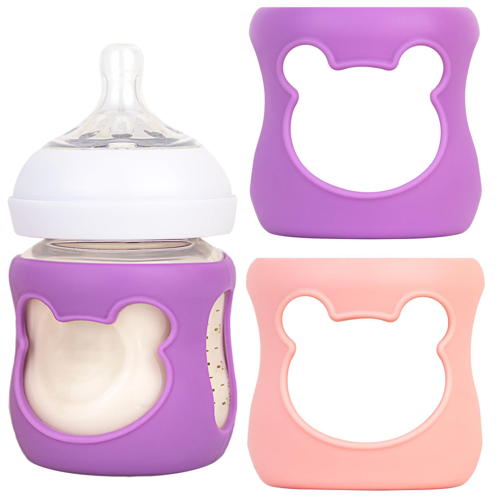 Aelop silicone bottle sleeve for Philips Avent 8oz in pink bear design provides grip and protection.