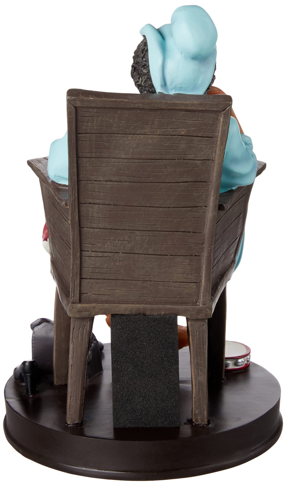 African American Expressions heartfelt grandma figurine enhances a cozy display honoring family memories.