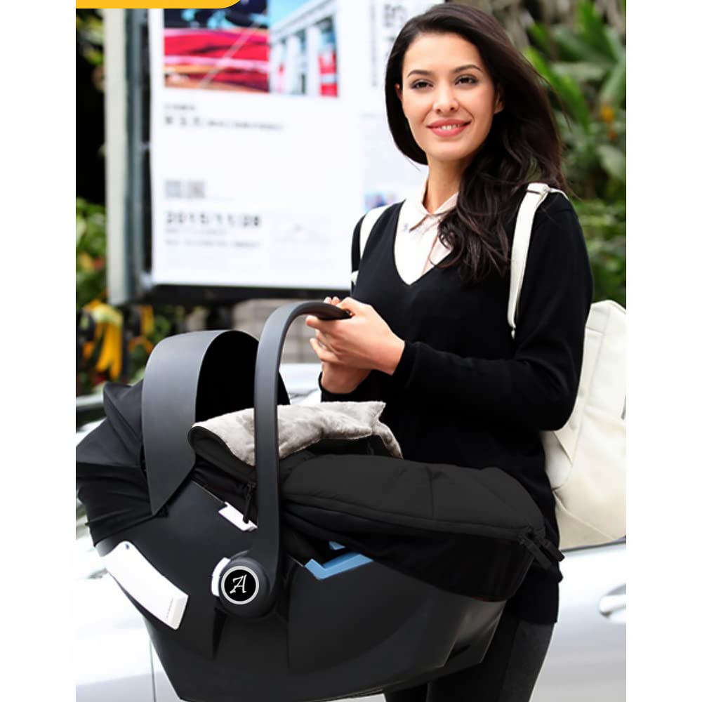 AGACAS winter outing with baby carrier cover keeps little one cozy.