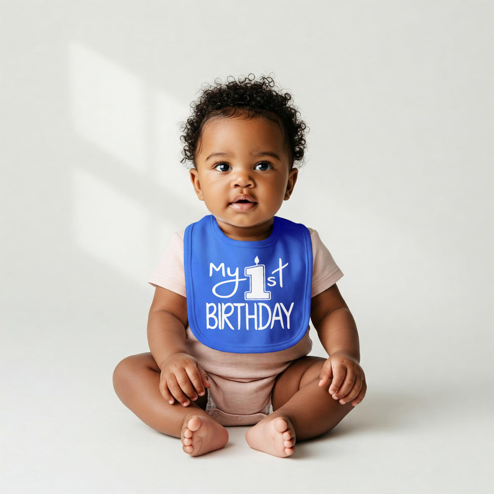 Aiden's Corner My 1st Birthday bib adjustable neck demonstrates secure fit for babies.