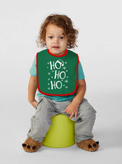 Aiden's Corner green baby holiday bib closeup highlighting soft fabric and skin-friendly feel