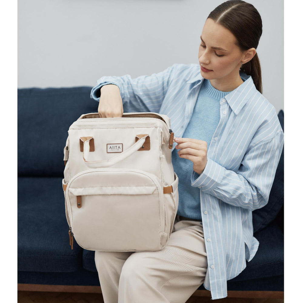 AIITA stroller attachment straps enable hands free travel with baby gear.