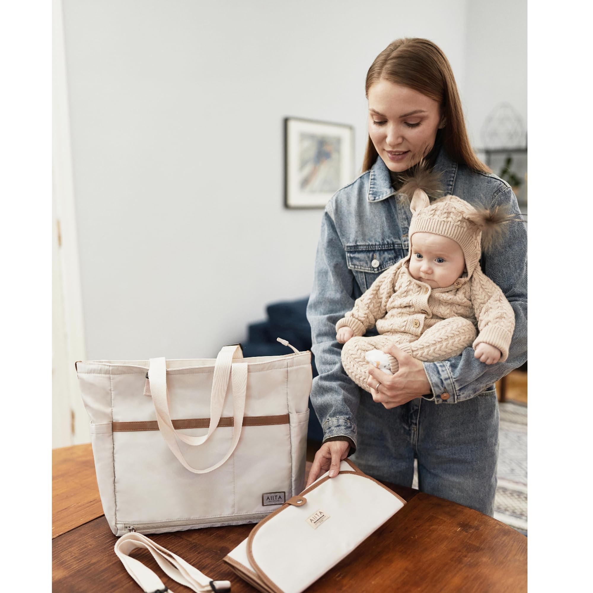 AIITA diaper bag tote includes anti-theft pocket for keys.