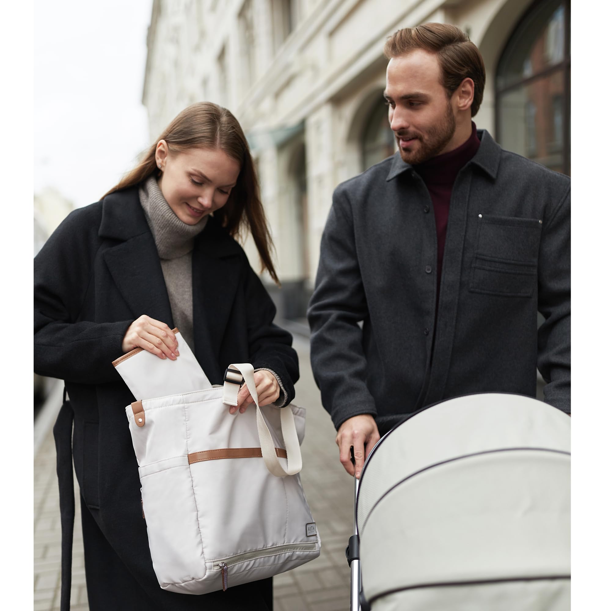 AIITA diaper bag tote offers versatile, stylish design for travel.