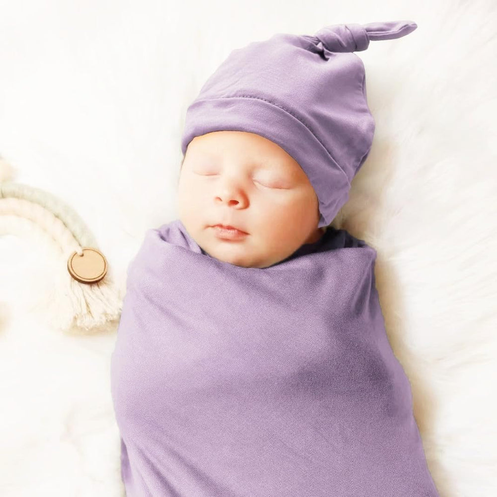 Aijoviko hat closeup highlights soft knit for warm, comfy newborn wear.