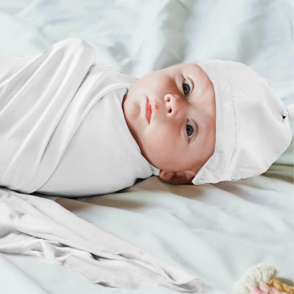 Aijoviko newborn swaddle on baby, showcasing gentle stretch and snug wrap.