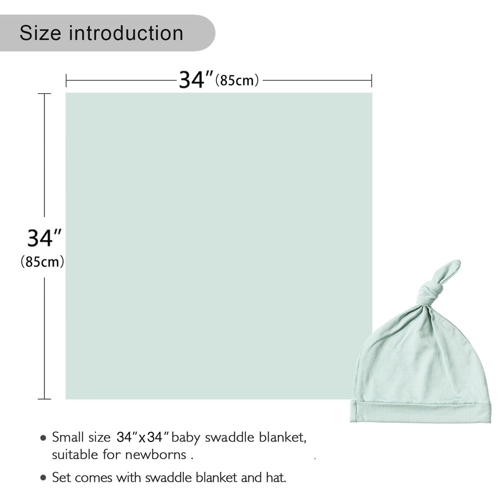 Aijoviko sage swaddle shown wrapped for on-the-go use with stroller.