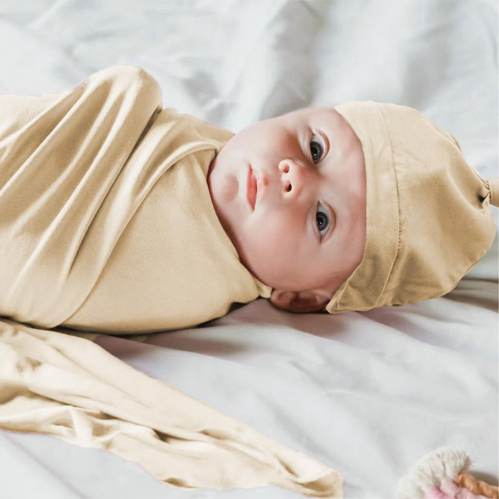 Aijoviko khaki swaddle folded neatly demonstrates portable warmth and secure wrapping.