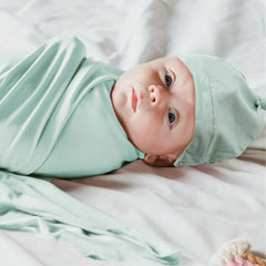 Aijoviko swaddle blanket hat set gift packaging showcases gender-neutral design for gifting.