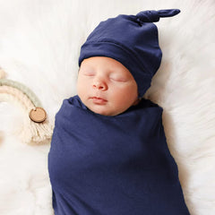 Aijoviko swaddle hat navy close-up highlighting comfortable, snug fit.